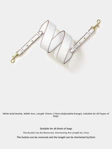 Detailed view of white adjustable 4cm leather bag strap with golden metal hooks