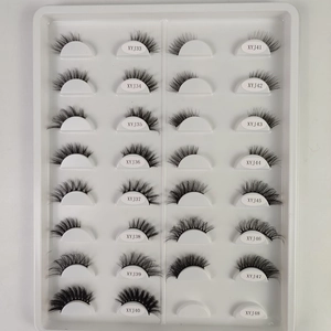 Macro view of cat-eye false eyelashes catalog showing various densities and styles