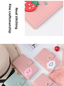 Detail of pink and green cartoon card holders featuring fine stitching and snap closures