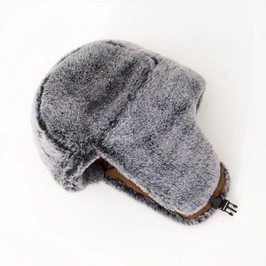 Gray faux fur aviator hat with warm brown lining and chin strap buckle on white background