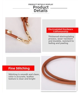 Detail of adjustable brown leather bag strap with golden electroplated metal hook