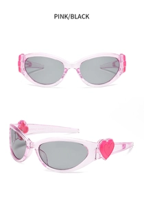 Detailed pink heart-shaped Y2K sunglasses with translucent frame and grey lenses
