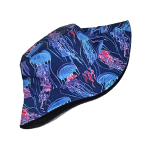 Detailed view of dark blue fisherman hat with colorful jellyfish patterns and fine stitching
