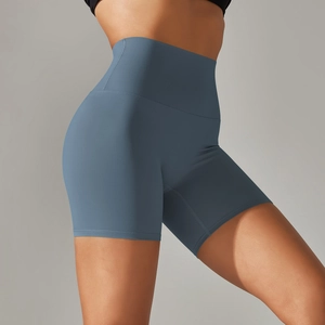 Close-up of seamless high waist and peach curve on blue 3-inch yoga shorts