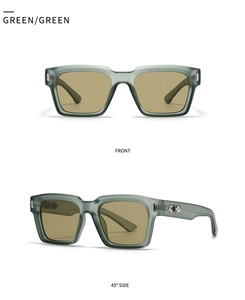 Macro detail of square green sunglasses frames with silver metal arrow accents