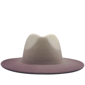 Close-up of dual-tone gradient felt fedora hat featuring beige to purple transition