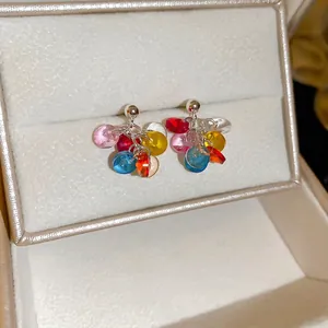 Colorful cluster bead earrings with silver studs and vibrant translucent glass charms