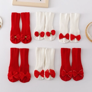 Children's red and white cotton floor socks with decorative bows and anti-slip dots
