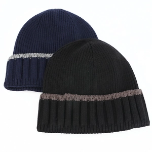 Detailed view of the vertical ribbed knit texture and striped cuff on winter beanies