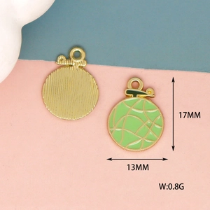 Detail view of mini melon charms in gold and green enamel with 17mm x 13mm dimensions