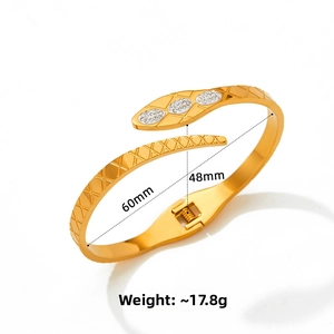 Detailed view of gold snake bracelet showing 60mm diameter and 17.8g weight specs