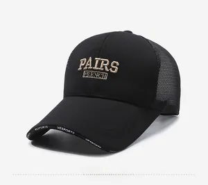Detail view of black breathable trucker hat with embroidered PAIRS FRENCH text and mesh back