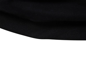 Detail of black ribbed knit cuffs and hem on a men's stand-up collar casual sweatshirt