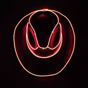 Detail of LED glowing orange neon wire outline on a black cowboy hat for party events