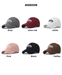 Detailed color display showing six baseball caps with embroidered logo in multiple shades