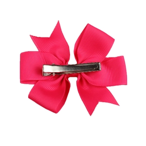 Detail of rose red ribbed grosgrain bow hair clip with silver metal alligator grip