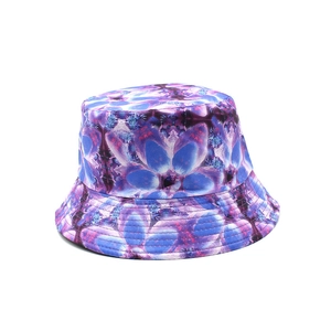 Close-up of blue and purple floral pattern texture on reversible summer bucket hat