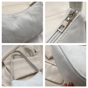 Detailed views of light grey corduroy baguette bag showing fabric texture and zippers