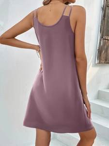 Rear view of slimming purple sleeveless V-neck maxi dress showing back cut detail