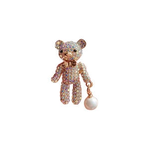 Chic teddy bear brooch in gold finish with colorful rhinestones and white pearl drop