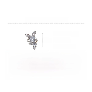 Detail view of butterfly ring made of copper and zircon measuring 2.3cm by 3.5cm