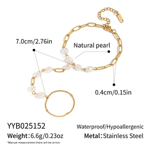 Detailed close-up of natural freshwater pearl finger bracelet with 18K gold plated steel