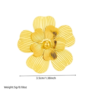 Golden hollow layered flower petal open ring with textured metallic finish on white background
