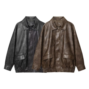 Vintage oversized faux leather jacket with turn-down collar and metallic buttons in black and brown