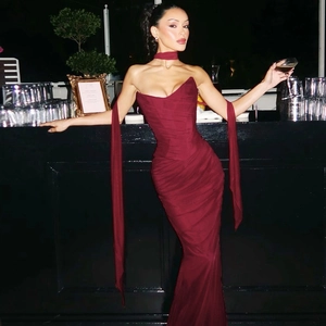 Detail of slim-fit dark red tube dress with double-layered mesh and matching neck strap