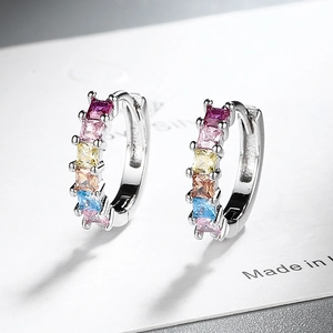 Silver rainbow hoop earrings with colorful square-cut cubic zirconia in a modern geometric style