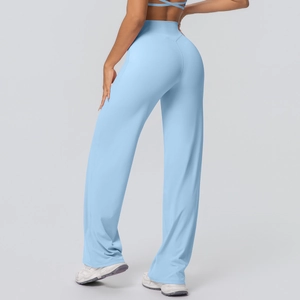 Detail view of light blue high-waisted yoga flare pants with V-shaped waistband contouring