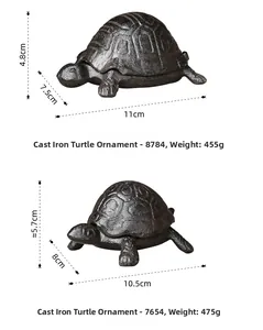 Detailed size and weight comparison of two vintage cast iron turtle storage boxes