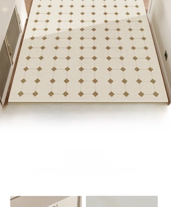 Detail of French vintage PVC doormat with brown diamond geometric patterns on beige