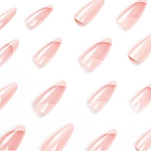 Pink French heart press-on nails in long almond shape with glossy gradient finish