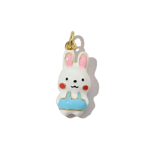 Detail showing a cute rabbit pendant with white enamel and golden edges for DIY jewelry