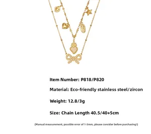 Detail showing gold stainless steel layered necklace with heart and star zircon charms