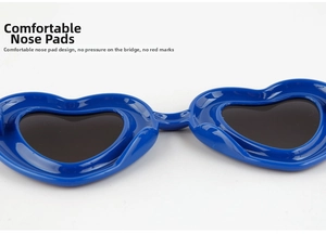 Detail of comfortable nose pads on blue heart-shaped sunglasses for a pressure-free fit