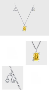 Detail of 925 silver necklace with yellow zircon pendant and Leo zodiac symbol charm