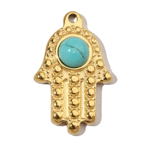 Detailed view of a golden Hamsa hand pendant featuring a central turquoise stone inlay