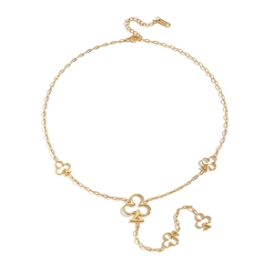 Collana dorata con ciondoli a forma di fiori di carte da gioco e frange eleganti