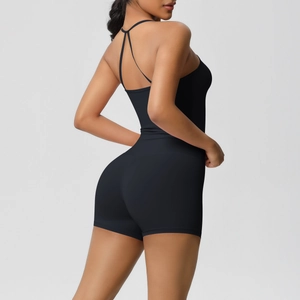 Detail view of the criss-cross back straps on a black brushed athletic yoga romper