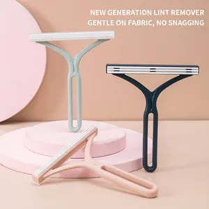 Set levapelucchi manuale in rosa, blu e verde per peli di animali e pilling