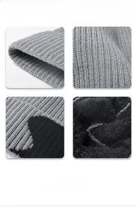 Detailed macro view of gray and black knit beanie with warm fleece lining and ribbed texture