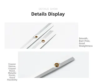 Close-up of smooth metal clock hands with copper sleeves and high precision finish