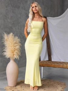Sexy yellow backless maxi dress with cross straps and slim fit for summer vacation