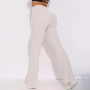 Detail view of high-waisted flared yoga pants with scrunch butt design in light grey