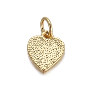Detailed view of heart-shaped 18K gold-plated pendant with a unique hammered texture