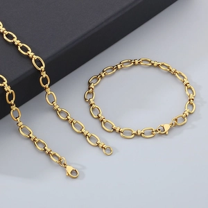 Ensemble collier et bracelet minimaliste en acier inoxydable doré avec maillons ovales chic