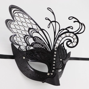 Detail of laser-cut black butterfly masquerade mask with sparkling rhinestones