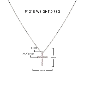 Detail showing 15x11mm pink zircon cross pendant dimensions and brass material info